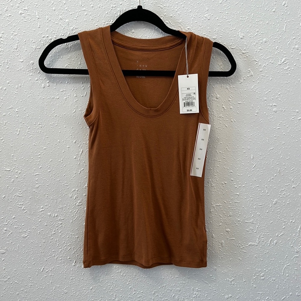 A new day tank XS never worn